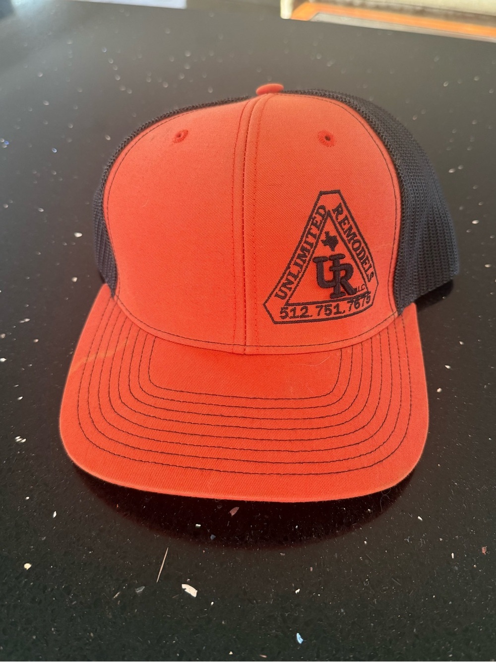 Unlimited Remodels Orange and Black Mesh Trucker Logo Snapback Hat